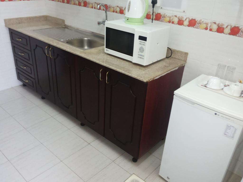 Azaiba Hotel Apartments Маскат Стая снимка